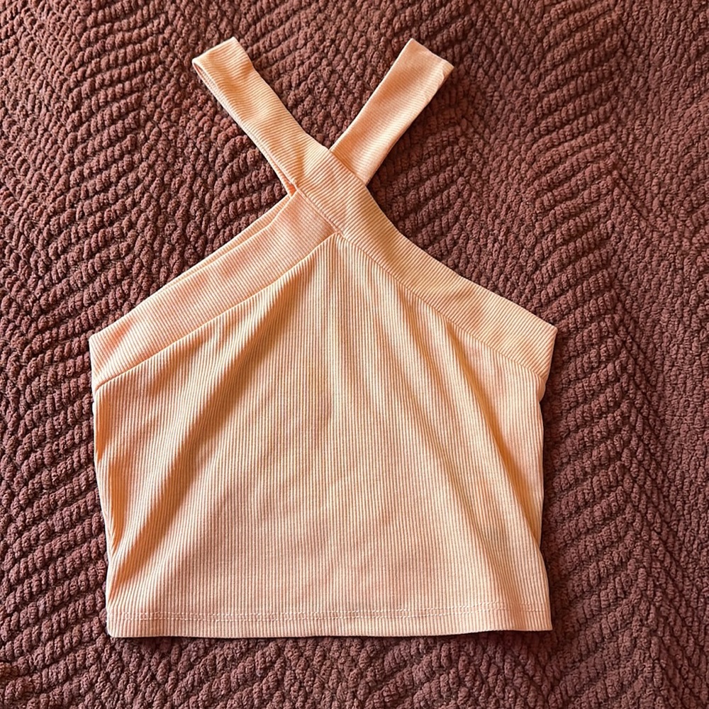 Cropped coral tank with cross straps